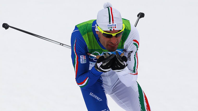 Di Centa couronné d'or en ski de fond