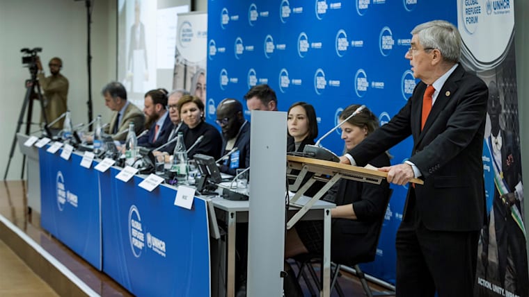 IOC President Thomas Bach announcing the Joint Sport Pledge on behalf of the Sport for Refugees Coalition at the Global Refugee Forum, committing USD 45 million to benefit 500,000 displaced people