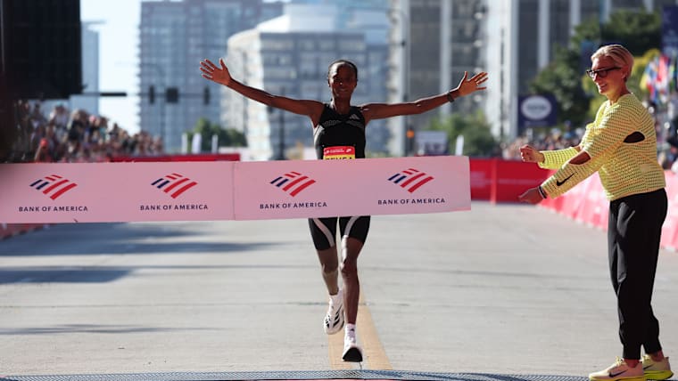 Hawi Feysa crosses the finish line at the 2026 Bank of America Chicago Marathon.