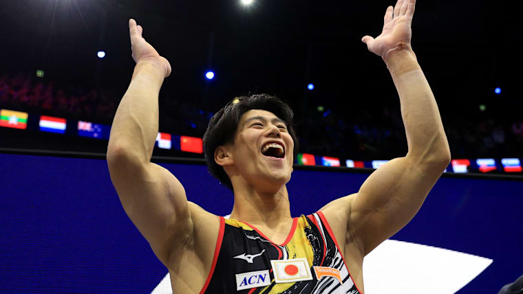Daiki Hashimoto of Team Japan reacts after winning