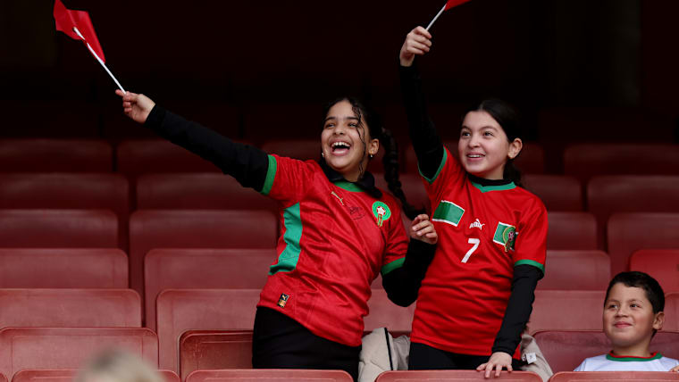 Young women's football fans at the FIFA Women's Champions Cup. 