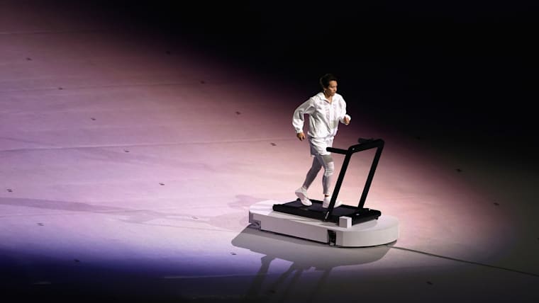 Arisa Tsubata runs on a treadmill during the Opening Ceremony of the Tokyo 2020 Olympic Games