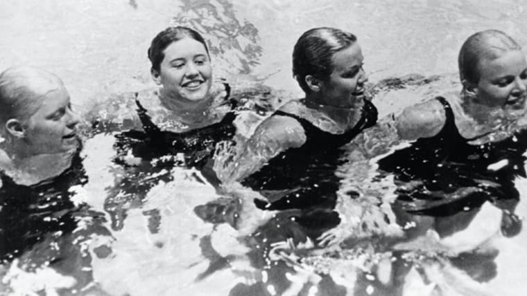 Backstroke queen Burke sends Olympic records toppling