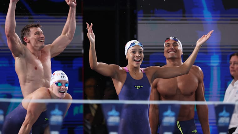 Gold medallists France's Mary-Ambre Moluh, Maxime Grousset, Marie Wattel and Carl Aitkaci celebrate