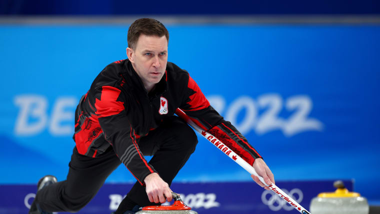 Brad Gushue of Team Canada competes against Team Italy during the Men's Curling Round Robin Session on Day 10 of the Beijing 2022 Winter Olympic Games