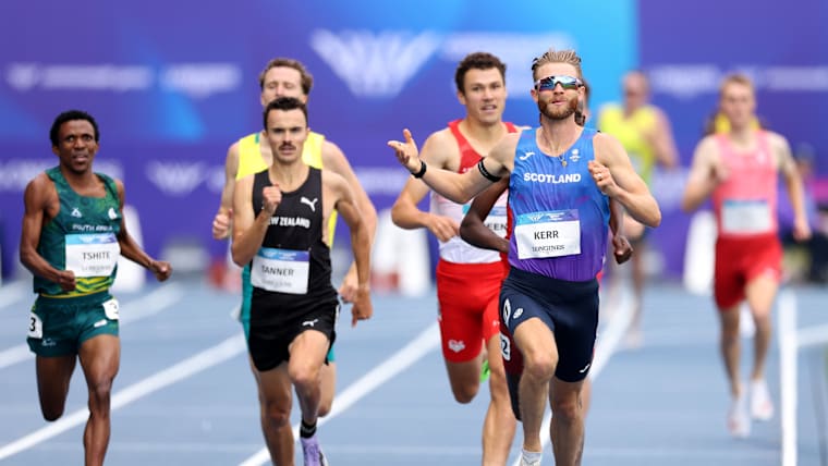 Josh Kerr of Team Scotland crosses the line to win his heat of the men's one mile at the Glasgow 2026 Commonwealth 