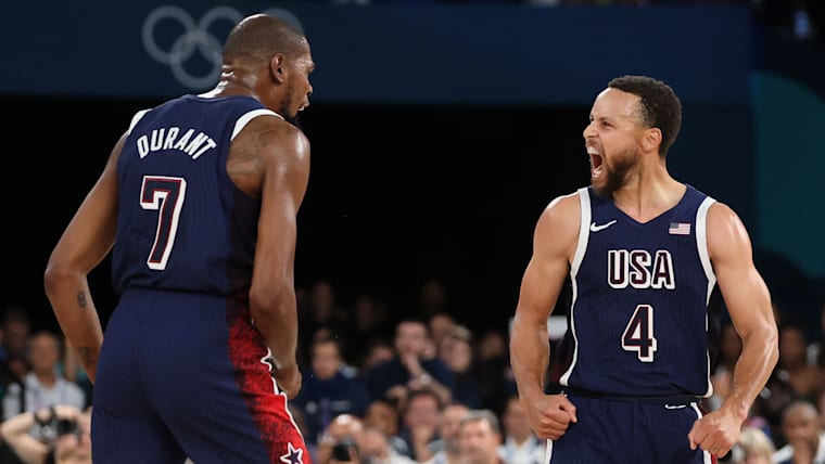 Kevin Durant #7 and Stephen Curry #4 of Team United States react during the Paris 2024 Men's Gold Medal game between Team France and Team United States 