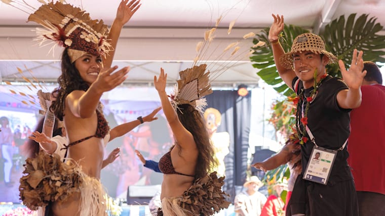 Rio Waida dances with local performers during the Opening Ceremony of Paris 2024 in Teahupo'o.