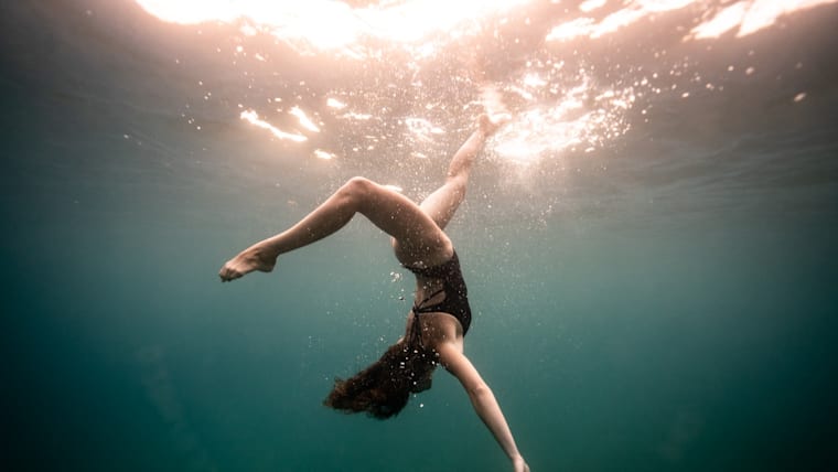 Margaux Caillier practises artistic swimming in the open waters of the French Basque Country.