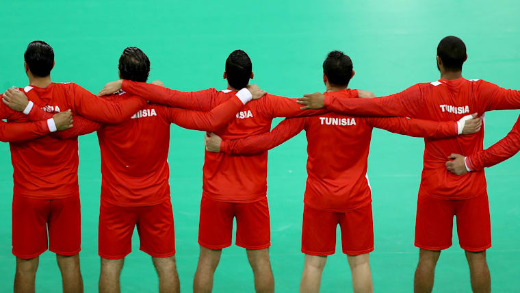 Team Tunisia lines up as their national anthem is played before the game against Denmark on Day 4 of the Rio Arena on August 9, 2016 in Rio de Janeiro, Brazil. (Photo by Elsa/Getty Images)