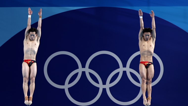 Long Daoyi and Wang Zongyuan of Team People's Republic of China compete in the Men's Synchronised 3m Springboard Final on day seven of the Olympic Games Paris 2024 at Aquatics Centre on August 02, 2024 in Paris, France.