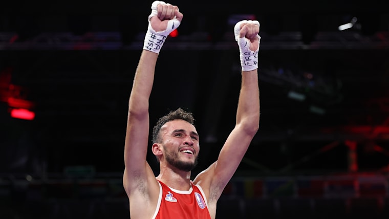 Billal Bennama of Team France celebrates after winning the Men's 51kg Quarterfinal round match against Alejandro Claro Fiz of Team Cuba on day seven of the Olympic Games Paris 2024 at North Paris Arena on August 02, 2024 in Paris, France.
