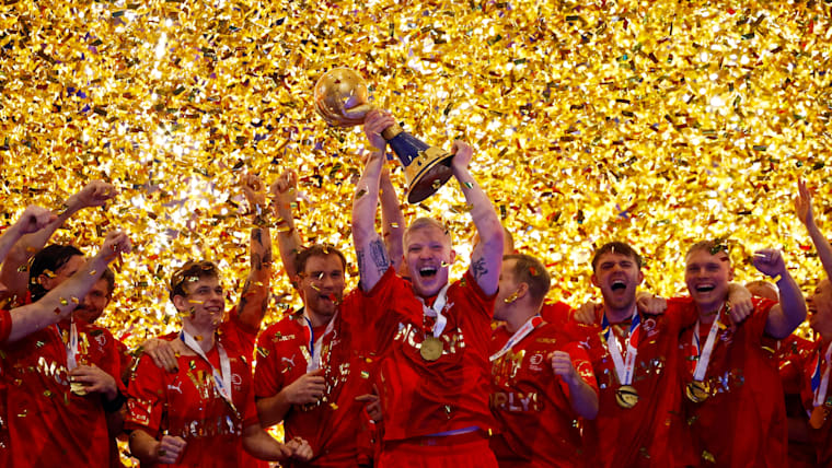 Denmark celebrate their fourth consecutive men's handball world title