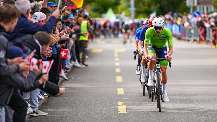 Tadej Pogacar (in green) in action