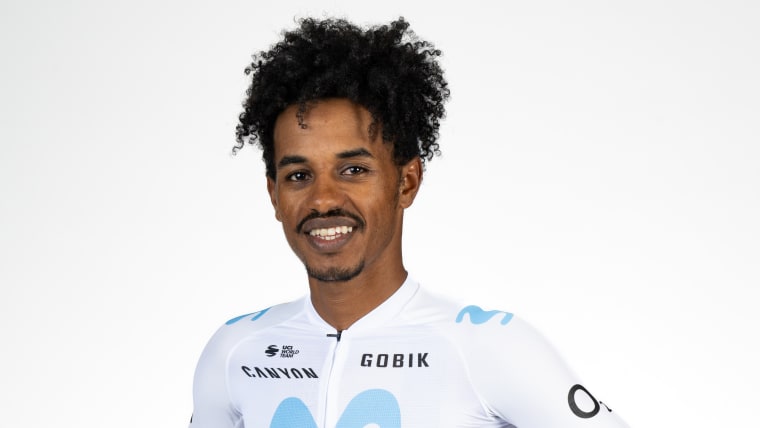 Tesfatsion poses for photos in his Movistar team outfit