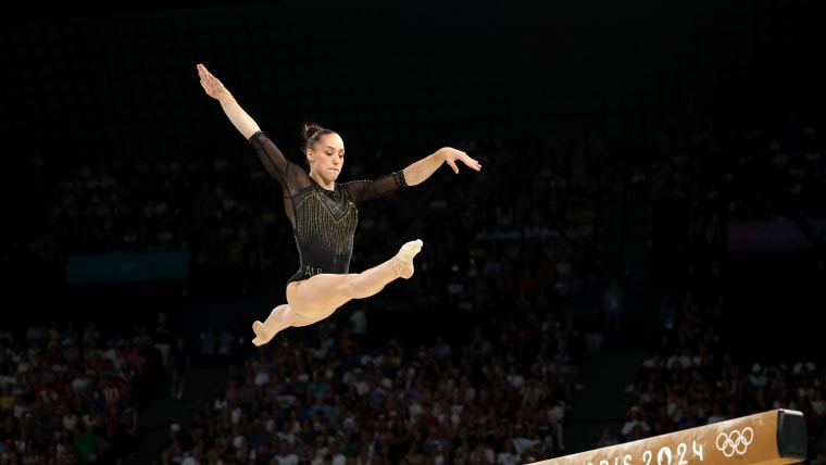 Kaylia Nemour of Team Algeria competes on the Balance Beam