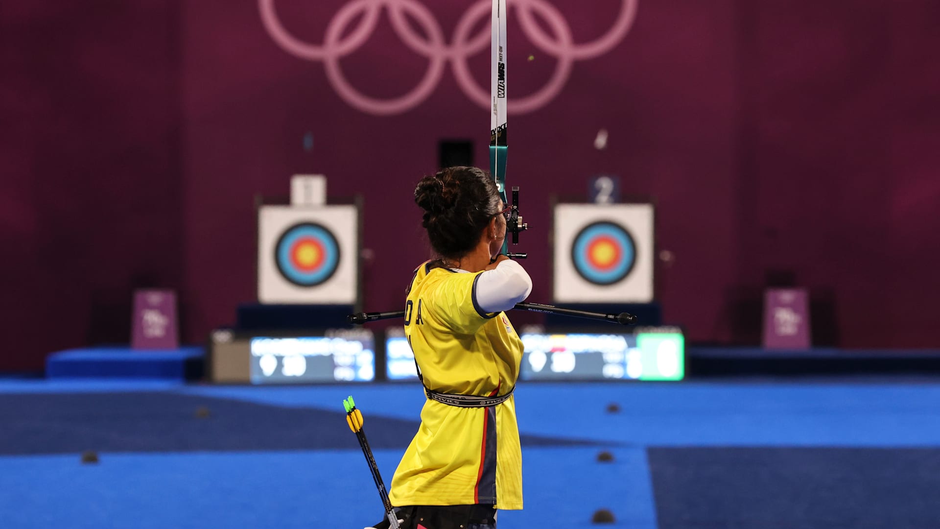 TOKYO, JAPAN - JULY 28: Adriana Espinosa de los Monteros of Team Ecuador competes in the archery Women's Individual 1/32 Eliminations on day five of the Tokyo 2020 Olympic Games at Yumenoshima Park Archery Field on July 28, 2021 in Tokyo, Japan. (Photo by Justin Setterfield/Getty Images)