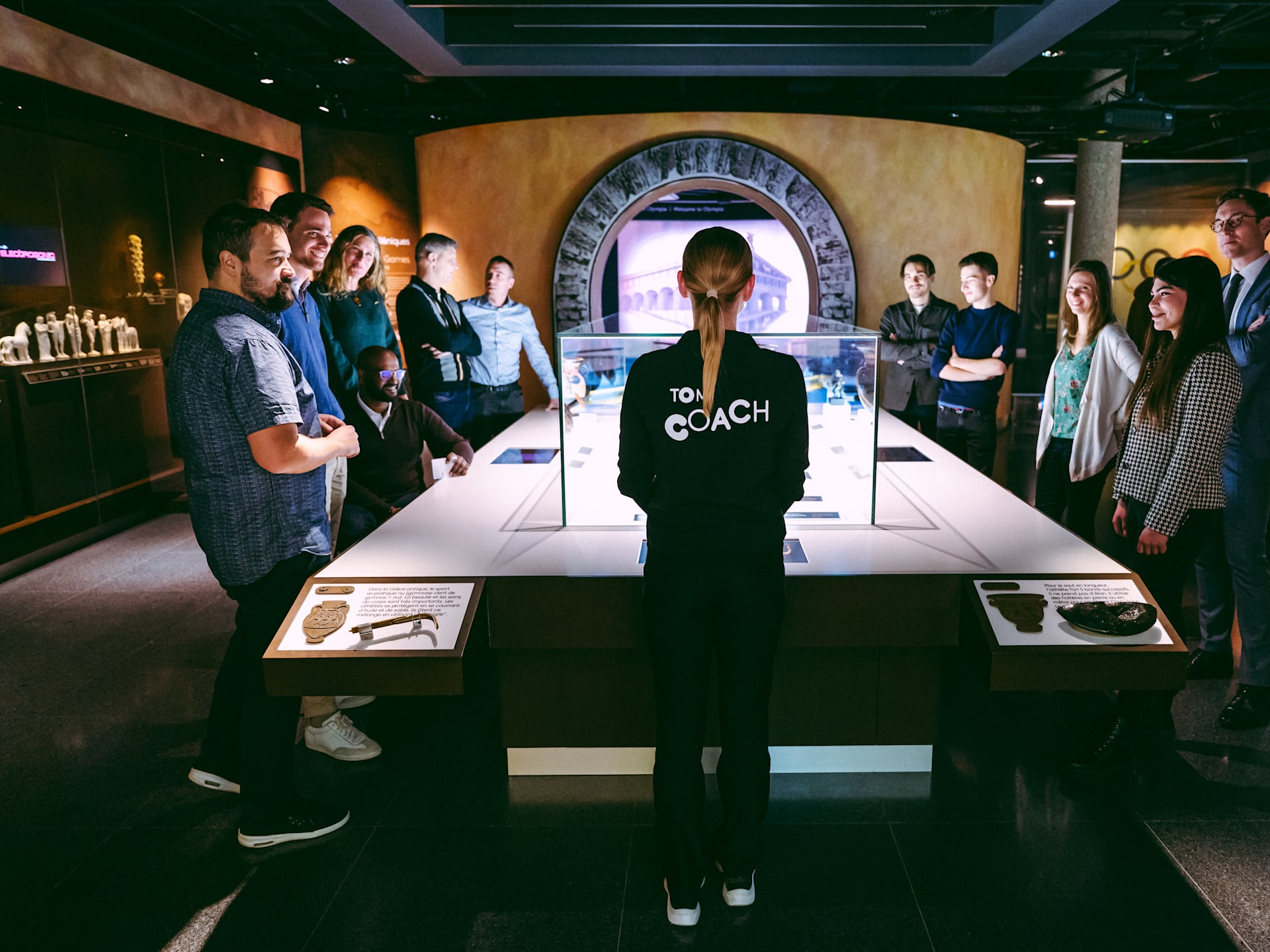 Coach giving a guided tour in the Permanent Exhibition