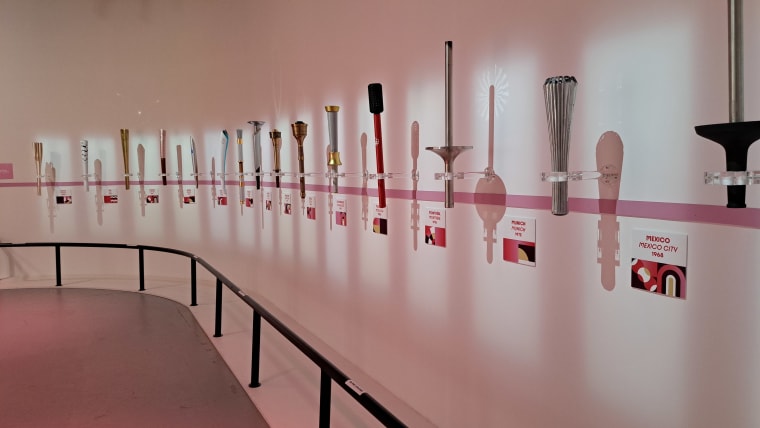 Complete set of Olympic Games torches displayed at Clubhouse 24, Palais de Tokyo, Paris.