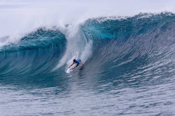 Australia's Molly Picklum compresses off the bottom as she aims for the barrel