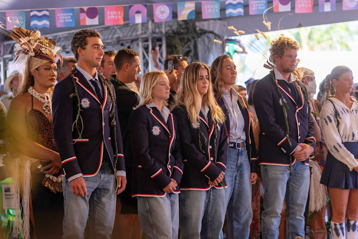 All five Team USA surfers, pictured here during the Opening Ceremony, have advanced to Round 3