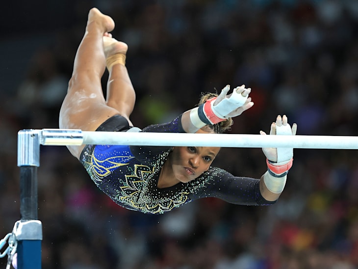 Rebeca Andrade performs at uneven bars