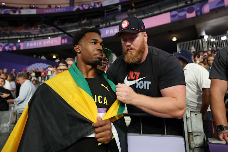 Discus champion Roje Stona (L) with Ryan Crouser, his coach