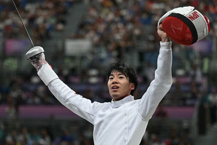 Japan's Koki Kano celebrates after winning against Kazakhstan's Ruslan Kurbanov in the men's epee individual round of 8 bout during the Paris 2024 Olympic Games at the Grand Palais in Paris, on July 28, 2024