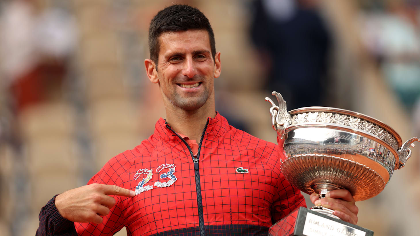 Novak Djokovic_RG_trophy_Clive_Brunskill_GettyImages-1497684401