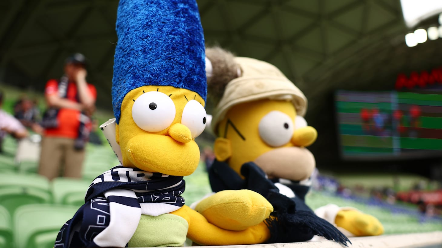Fans dress Simpsons characters in Victory scarves during the round two A-League Women's match between Melbourne Victory and Melbourne City at AAMI Park on November 09, 2024