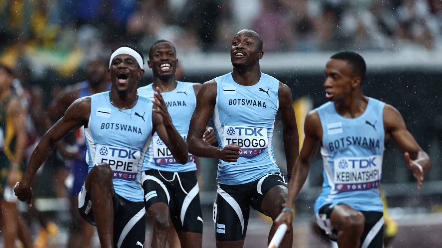 Botswana's Lee Bhekempilo Eppie, Letsile Tebogo, Bayapo Ndori, and Busang Collen Kebinatshipi celebrate after winning gold. 