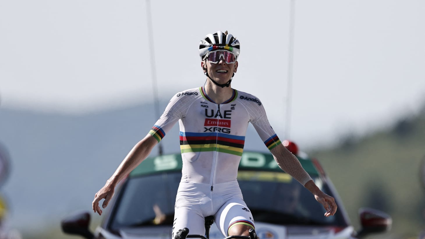 Tadej Pogacar celebrates winning stage 12 of the 2025 Tour de France in Hautacam