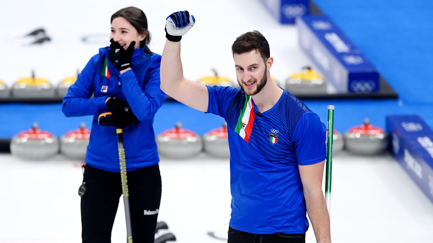 Amos Mosaner and Stefania Constantini celebrate winning the gold medal against Team Norway.