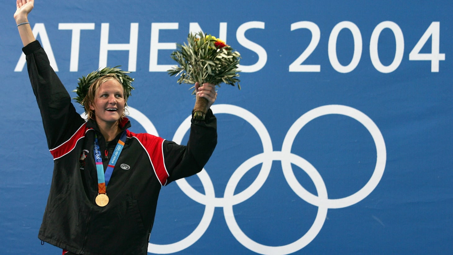 Five-time Olympian Kirsty Coventry won her first Olympic gold in the women's 200m backstroke at Athens 2004