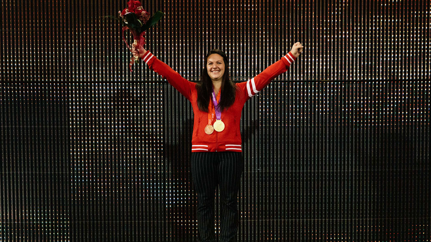 Christine Girard is awarded reallocated Olympic medals. Photo credit: John Kealey/COC.