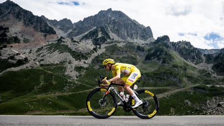 Tour de France cyclists battling mountain ascents in 2025