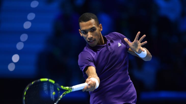 Felix Auger-Aliassime of Canada plays a forehand against Alexander Zverev of Germany in the Menâ€™s Singles Group Stage match during day six of the Nitto ATP Finals 2025 at Inalpi Arena on November 14, 2025 in Turin, Italy.