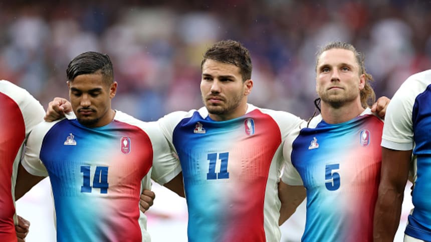  Antoine Dupont of Team France lines up with teammates.