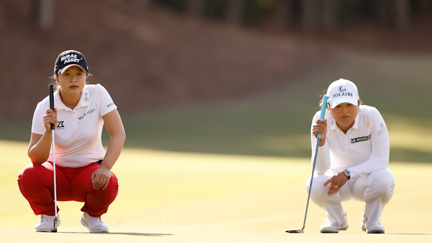 Kim Sei-young (L) and Ko Jin-young line up putts during the final round of the 2020 CME Group Tour Championship