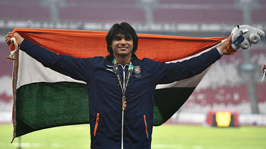 Neeraj Chopra celebrates after winning the gold medal in javelin throw at the Asian Games 2018.