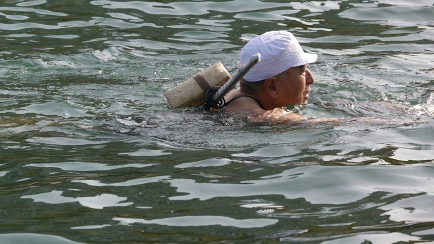 Tokyo 2020 Torch Relay - Traditional Japanese Swimmers
