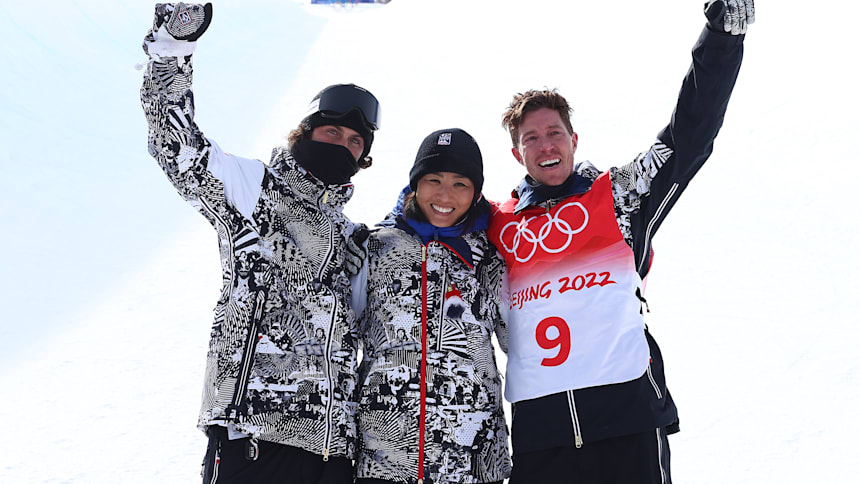 Shaun White, right, with coach JJ Thomas and physio Esther Lee at the Beijing 2022 snowboard halfpipe final runs