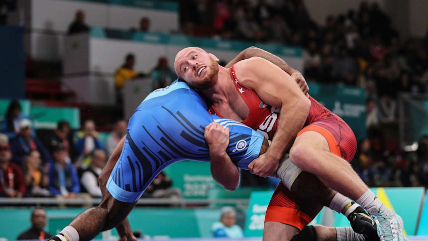 Kyle Snyder (R) takes on Costa Rica's Maxwell Lacey in the 2023 Pan American Games 97kg semi-finals
