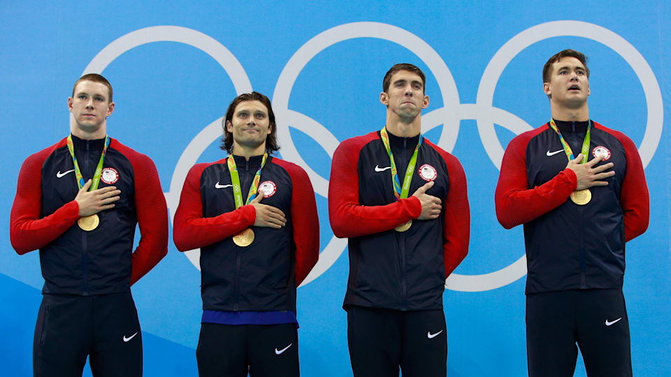 Gold medallists Ryan Murphy, Cody Miller, Michael Phelps and Nathan Adrian of the United States on the podium after the 4 x 100m Medley Relay Final of the Rio 2016 Olympic Games (Photo by Adam Pretty/Getty Images)