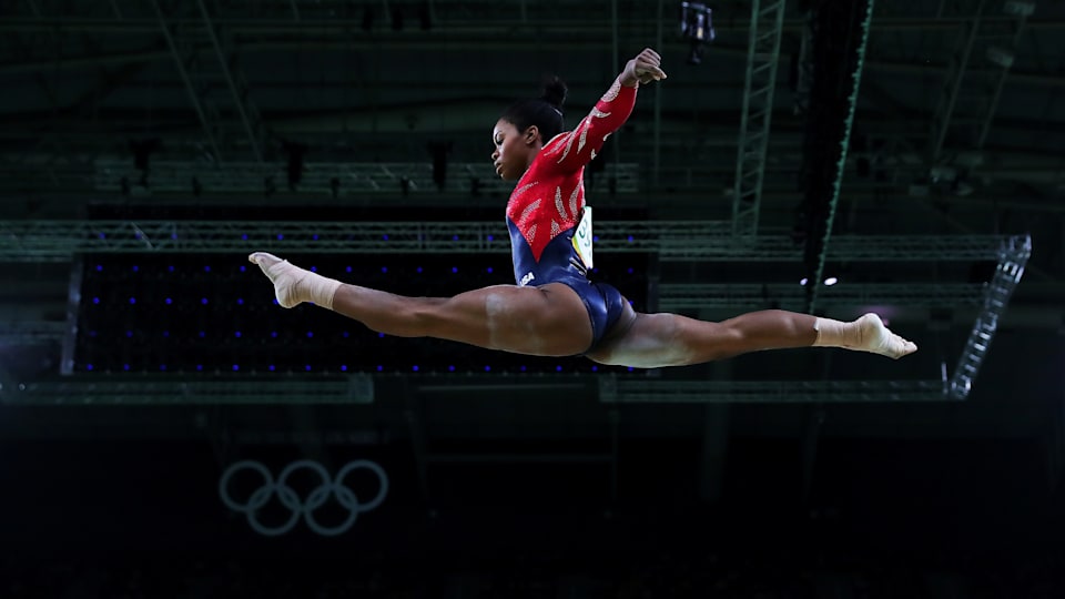 Gabrielle Douglas of the United States competes on the balance beam
