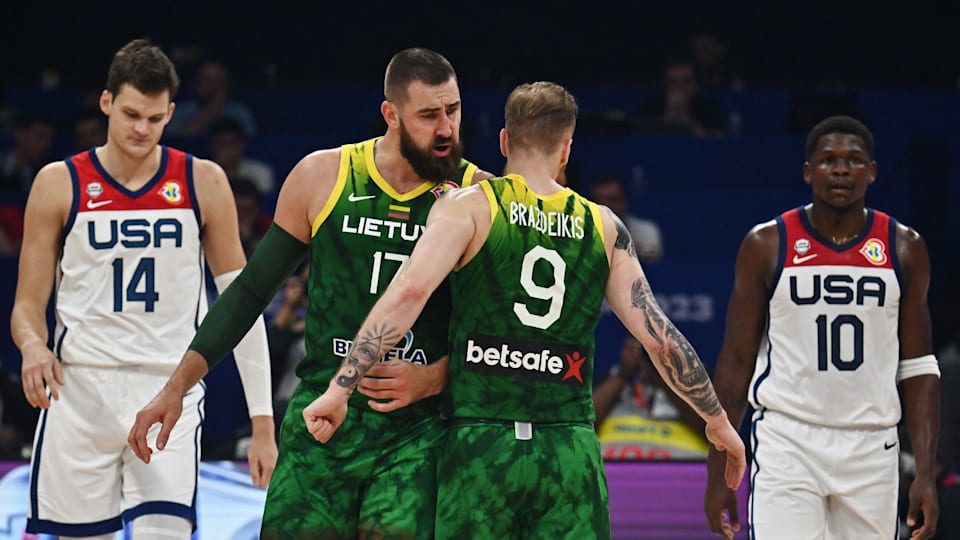 Lithuania's Jonas Valanciunas and Ignas Brazdeikis celebrate during their FIBA World Cup win over USA