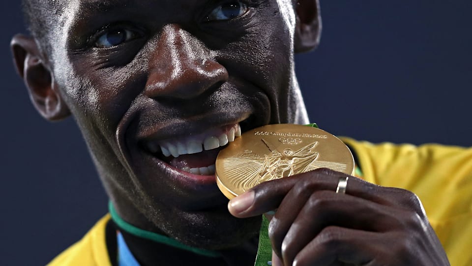 Why do Olympians bite their medals?