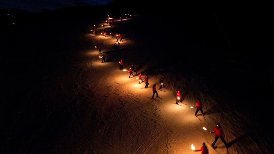 100 skiers light up the slopes of Cortina d’Ampezzo to celebrate 100 years of the Olympic Winter Games
