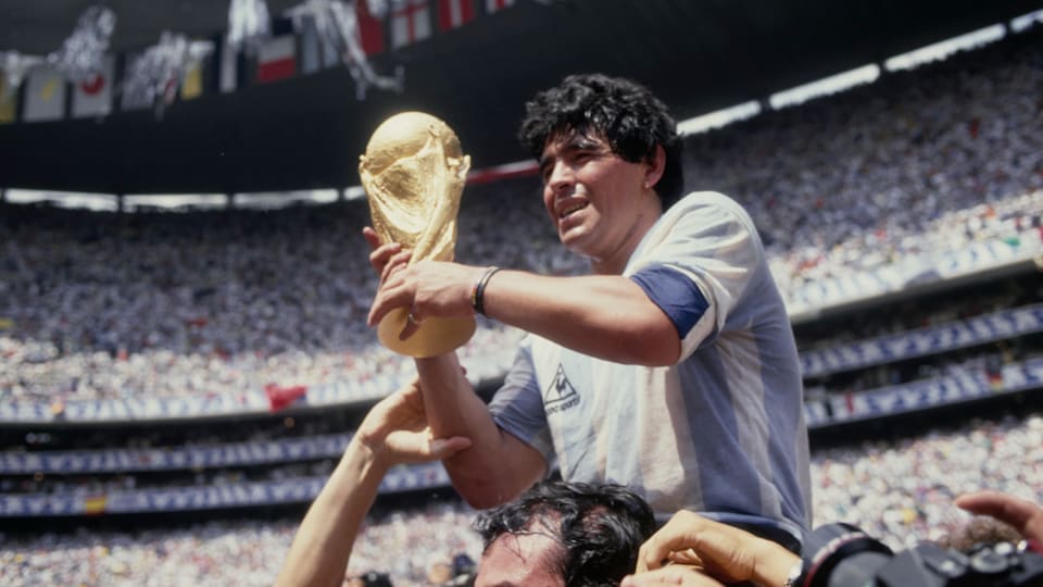 Argentina football team's Diego Maradona with the FIFA World Cup 1986.