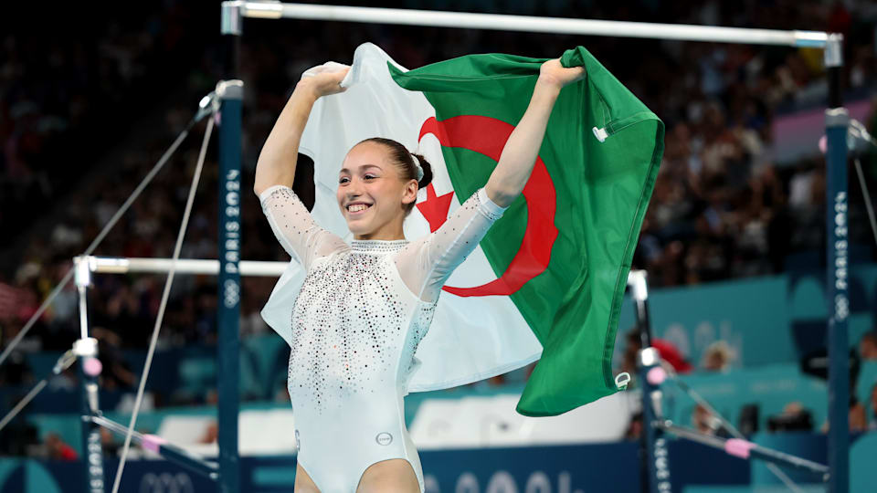 Kaylia Nemour of Algeria celebrates her historic artistic gymnastics gold at Paris 2024.